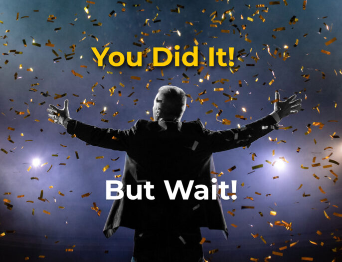Man with open arms celebrating victorious, spotlights are on him, victory pose, confetti flying all around him. A text overlay reads: You Did it! but wait!